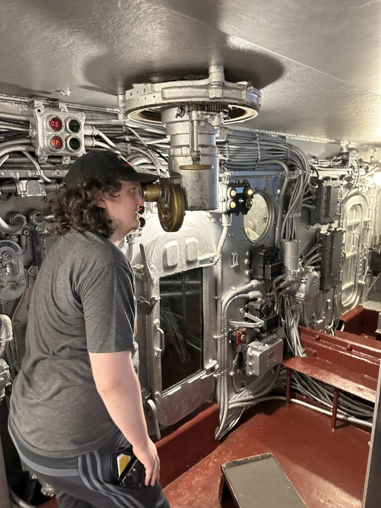 Bradley checking  out the view sight from below deck